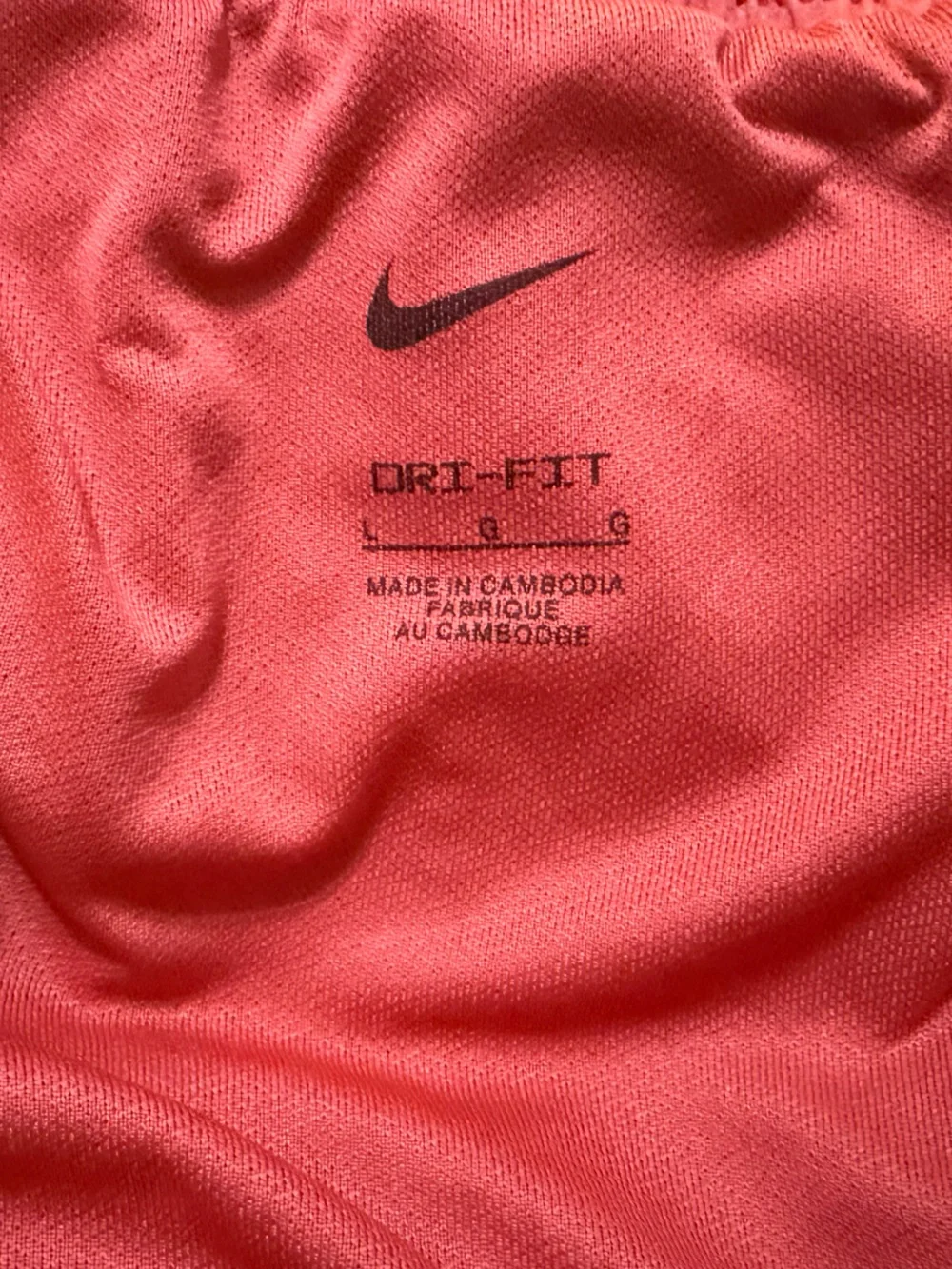 Nike Women's Coral Athletic Shorts with Silver Swoosh